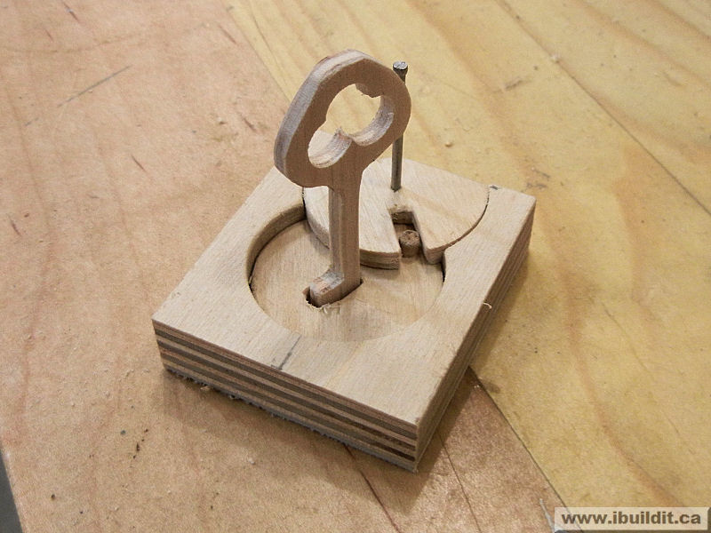 wooden key in wood lock